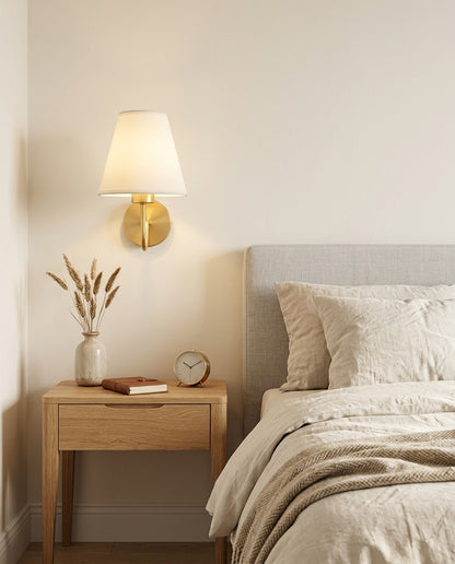 E27 wall lamp with white fabric shade above a bedroom nightstand